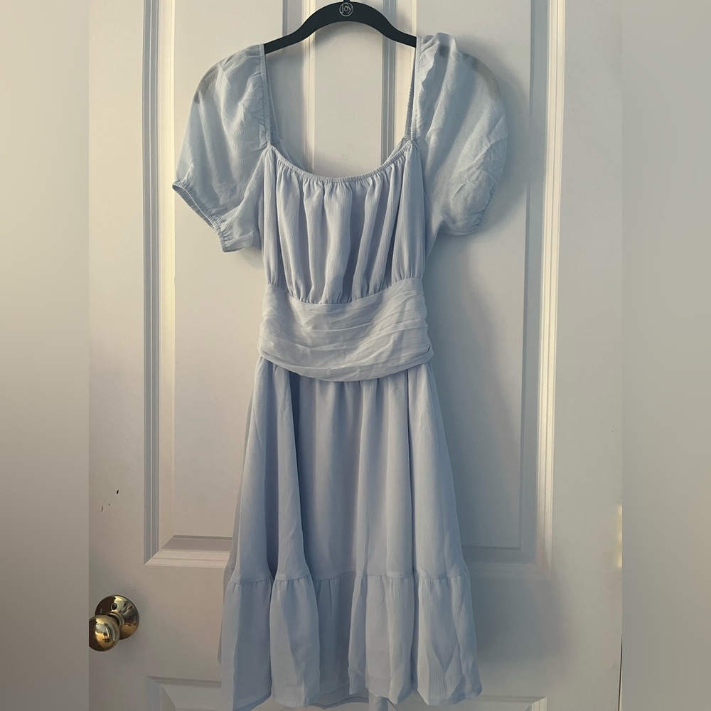 Baby blue EXLURA flowy dress. With a tie in the back. Great for gatherings.